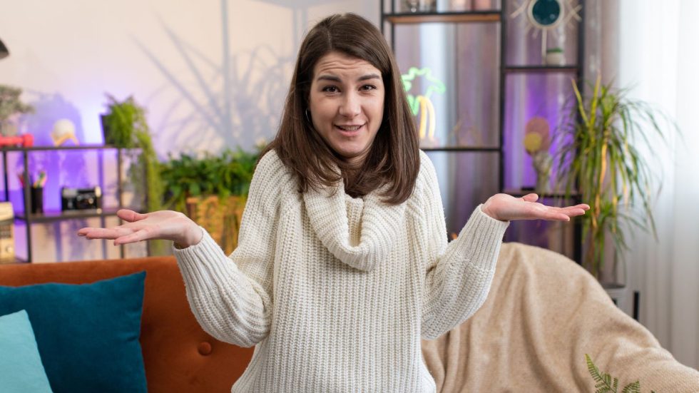 Confused Woman Shrugging